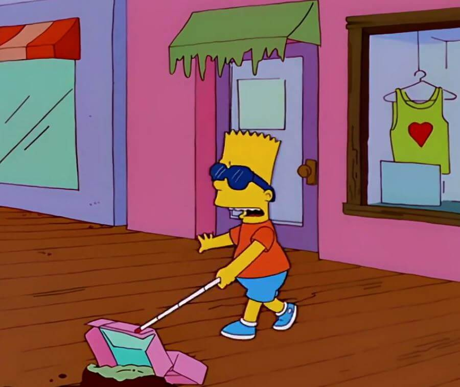 Bart Simpson wearing sunglasses and using a white cane